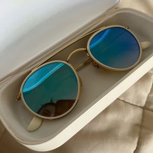 Blue mirrored round rayban sunglasses